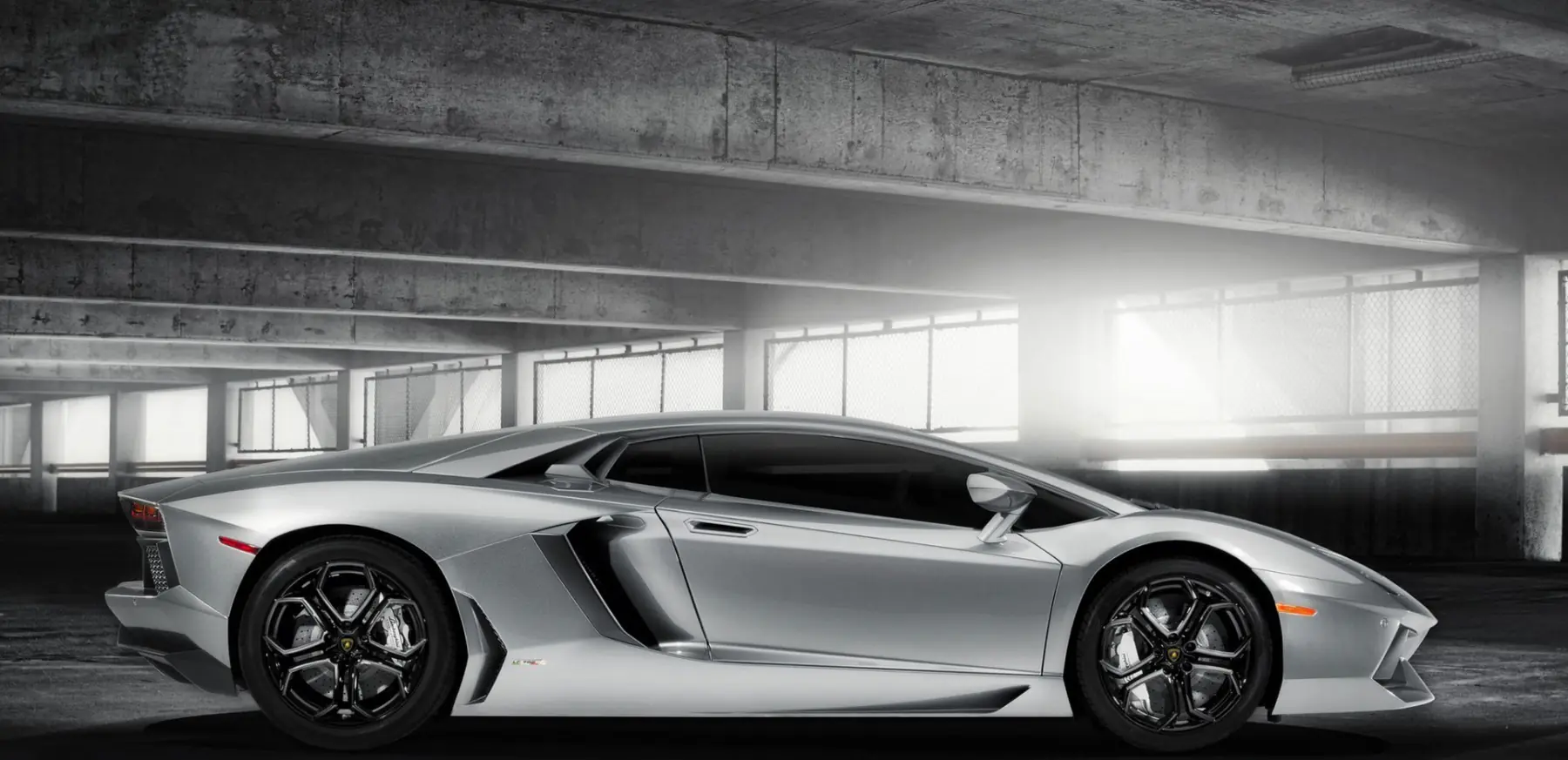 Silver performance vehicle with a pristine protected finish